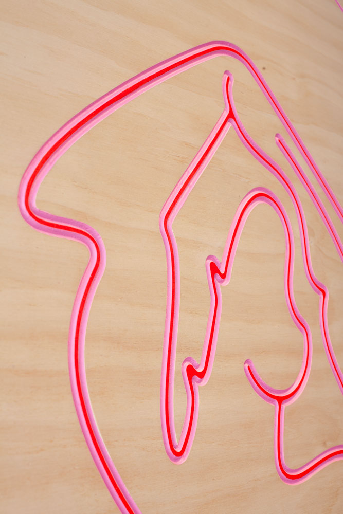 Close-up of line painting on plywood